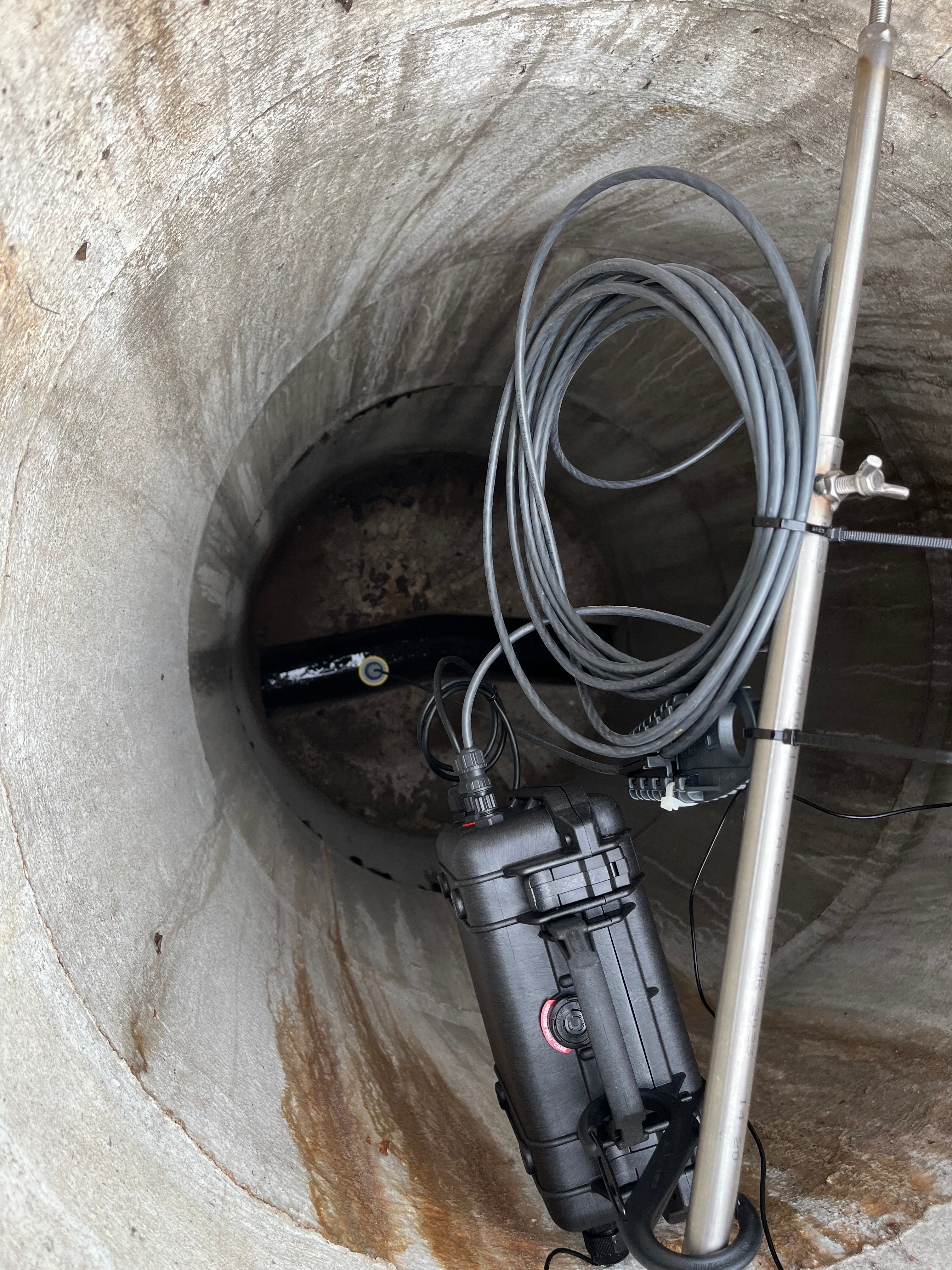 Cable hanger with integrated strain relief