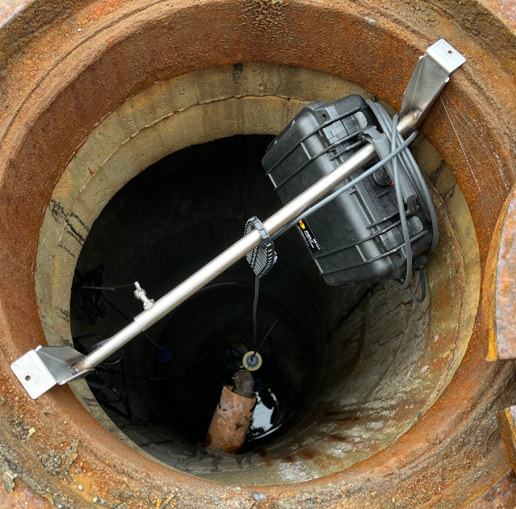 Cable hanger with integrated strain relief
